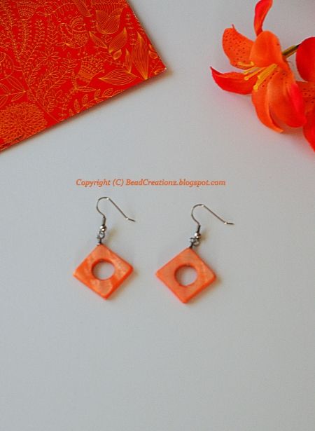 Orange mother of pearl earrings photo 119ffc53-2711-410a-a8d3-b5dc885c28a1_zps86954773.jpg