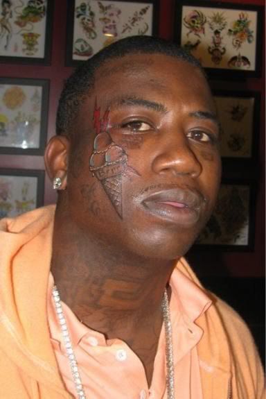 ENTERTAINMENT NEWS: Gucci Mane Tattoos Icecream Cone on His Face [Photos 